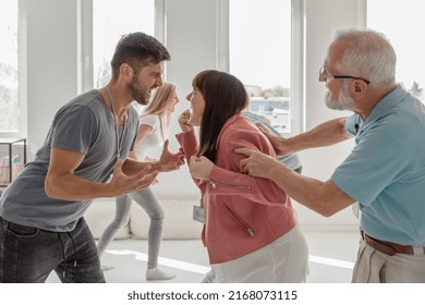 Two Friends Screaming On Each Othrers During Bioenergy Therapy Session