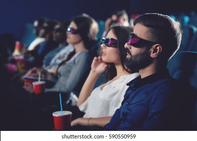 Two Friends Watching Movie In 3d Glasses.