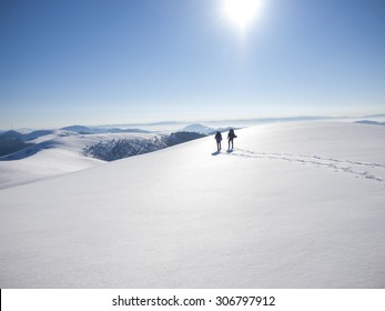 Two Friends Went Hiking In Winter Mountains.