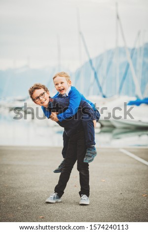 Similar – Foto Bild Seniorsportlerin und kleines Mädchen High Five