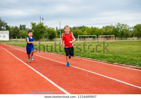 Two Gay Boy Doing Athletics Sports Stock Photo (Edit Now) 1156689847