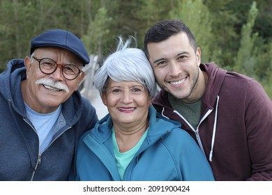 Two Generation Hispanic Family Outdoors  