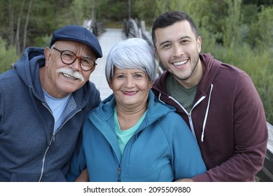 Two Generation Hispanic Family Outdoors