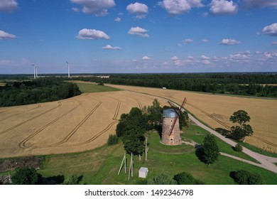 two generation - Old and New Windmills in farmland, Lithuania, aerial view
