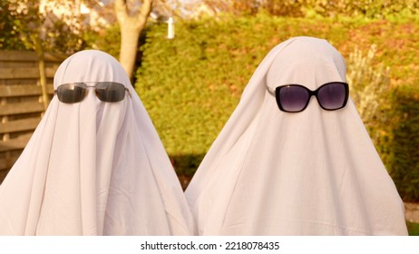 Two Ghosts With Black Sunglasses