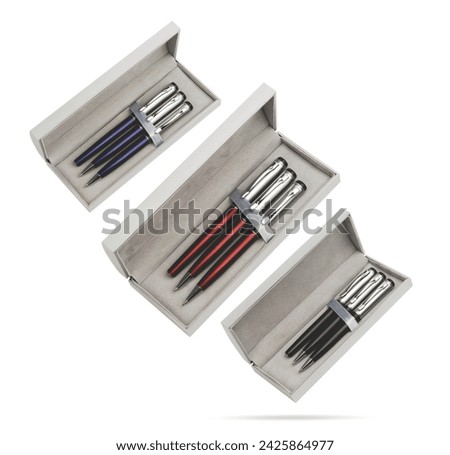 Two gift pens in classy, opened soft plastic or paper pencil box. Gift box packaging for promotional branding. Promotional gift twin pens in box. Silver, blue and red colored pens.