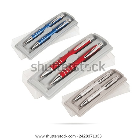Two gift pens in classy, opened soft plastic pencil box. Gift box packaging for promotional branding. Promotional gift twin pens in box. Silver, blue and red colored pen sets.