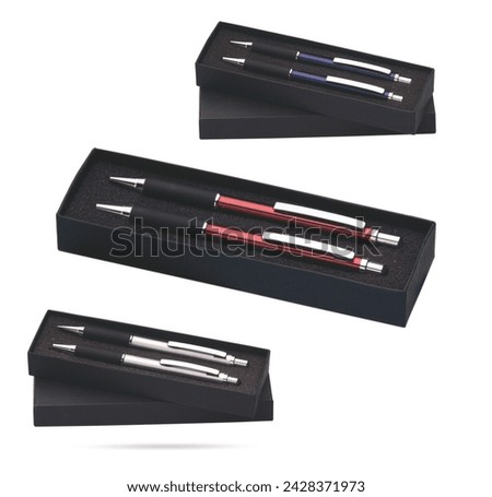 Two gift pens in classy, opened soft black paper pencil box. Gift box packaging for promotional branding. Promotional gift twin pens in box. Silver, blue and red colored pens.