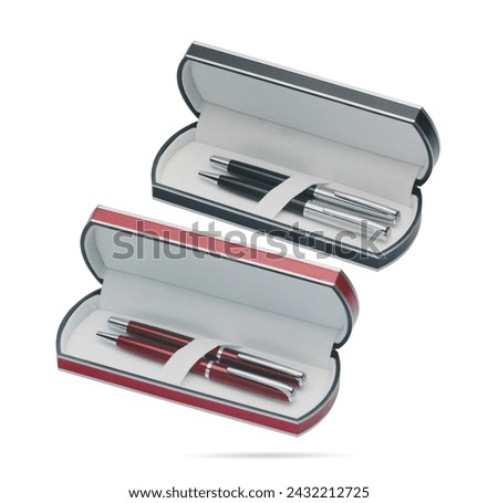 Two gift pens in classy, opened soft plastic or paper pencil box. Gift box packaging for promotional branding. Promotional gift twin pens in red and blue boxes. Silver, blue and red colored pens.