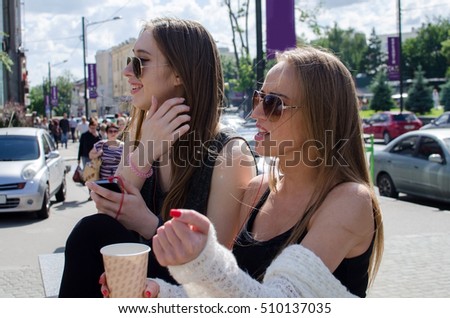 Two girlfriends enjoing time together during the summer