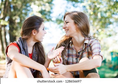 Two Girlfriends Outdoor Talking