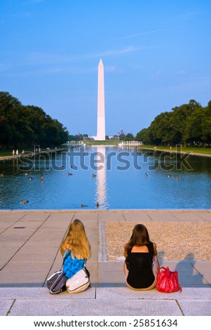 Two girls admiring the Washington monument