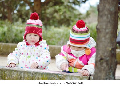 Two Girls Can Not Share Toys On The Walk