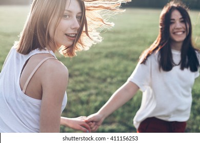 Two Girls Having Fun Outdoors. Best Friends