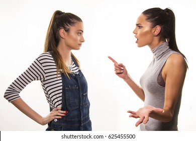 Two Girls Having Hard Talk, Polemic And Argue Between Friends, Sisters Or Roommate Concept