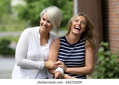 Two Girls Laughing