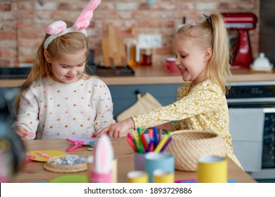 Two girls making decorations for Easter                                - Shutterstock ID 1893729886