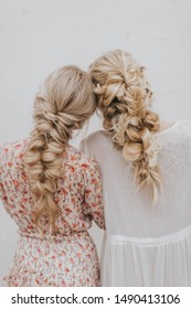 Two Girls Putting Heads Together With Pretty Braids