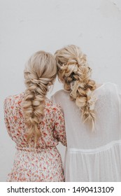 Two Girls Putting Heads Together With Pretty Braids