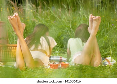 Two girls are resting in park