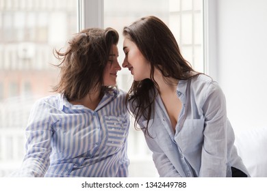 Two Girls Same Sex Going To Kiss On Window Sell