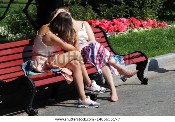 Two Asian Girls Sharing A Guy