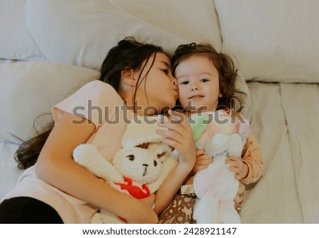 Similar – mother and child son sleeping together in bed