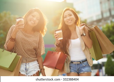 Two Glamorous Asian Women Shopping Together