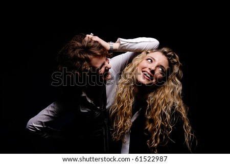 Similar – Image, Stock Photo Studio portrait of a young couple hugging