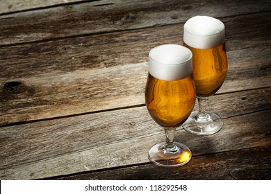 Two Glass Beer On Wood Background With Copyspace