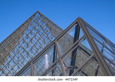 Two Glass Pyramids In Louvre In Paris, France