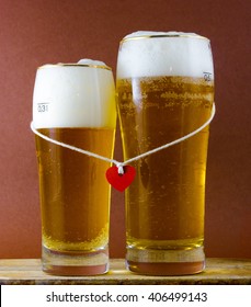   Two Glasses Of Beer For Lovers. Octoberfest.Valentines Day. Happy Couple Concept