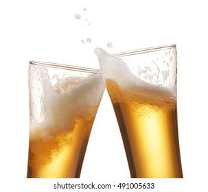 two glasses of beer toasting creating splash