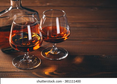 two-glasses-brandy-cognac-bottle-260nw-381111400.jpg