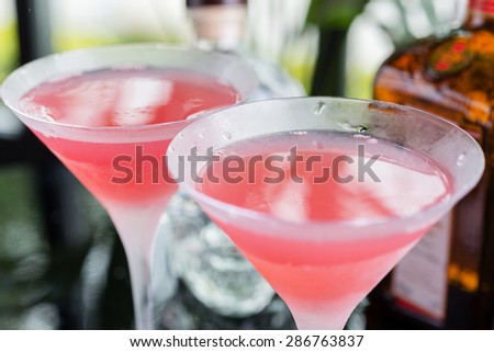 Similar – Image, Stock Photo Transparent pink alcohol cocktail, vodka gin-tonic