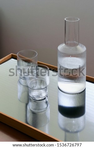 Similar – Image, Stock Photo Water carafe with glasses on a table