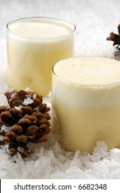 Two Glasses Of Egg Nog In A Bed Of Snow Flakes