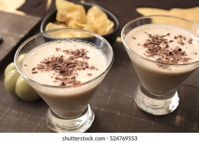Two Glasses Filled With A Milk, Amaretto, Hazelnut Liqueur Drink For A Holiday Get Together