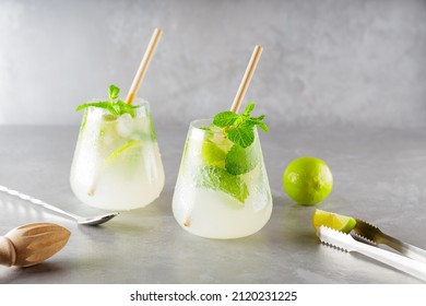 https://image.shutterstock.com/image-photo/two-glasses-mojito-bar-accessories-260nw-2120231225.jpg