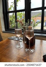 Two glasses on a pub table