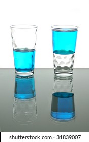 Two Glasses, One Half Full, One Half Empty