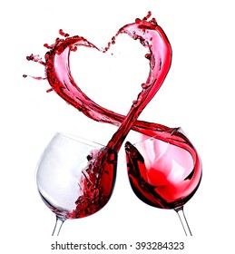 Two Glasses Of Red Wine. Heart Splash