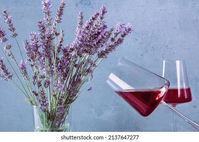 Two Glasses Of Rose Wine And A Bouquet Of Lavender Flowers. Provence Wine Tasting