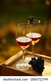 Two Glasses Of Rose Wine On A Wooden Crate, Top View