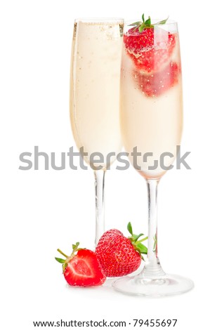 Two glasses of sparkling wine (champagne) and strawberry on white