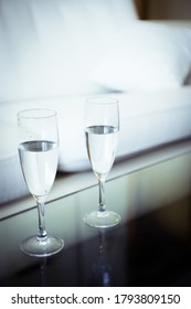 Two Glasses Of Water On A Glass Table. No People