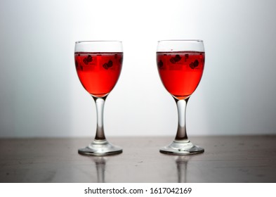 two glasses of wine are parallel