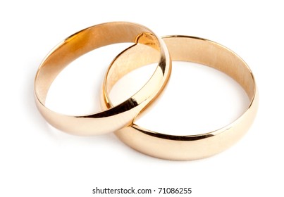 Two Gold Rings On White Background