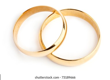 Two Gold Rings On White Background