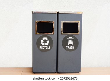 Two gray trash cans with general waste and recycling on white background. - Shutterstock ID 2092062676